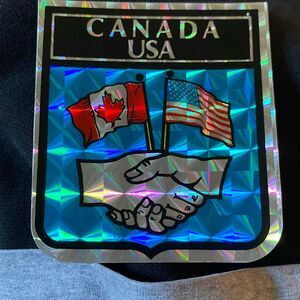 Vintage Canada US Friendship Handshake Prismatic Sticker